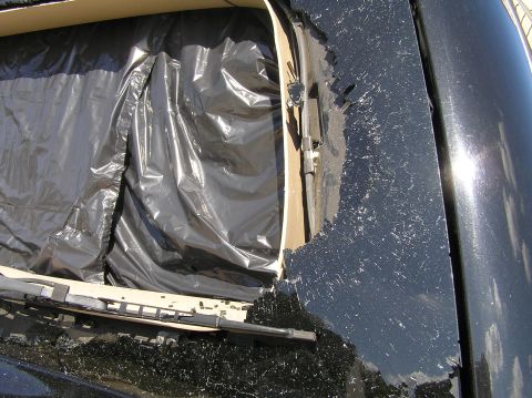 2000 Ford Excursion - The ball went through the window on the bottom right-hand corner. Not sure if the defroster connector is damaged or not.