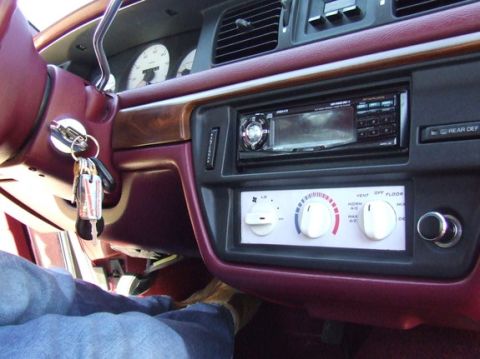 1992 Ford Crown Victoria - Interior view of a 1992 Ford Crown Victoria showing the dashboard, HVAC controls, and an aftermarket stereo system.