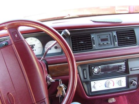 1992 Ford Crown Victoria - The white face gauges and dashboard of a 1992 Ford Crown Victoria are visible.
