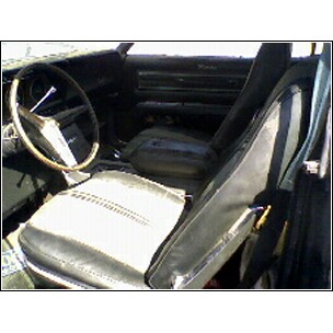 1973 Ford Ranchero - Interior view of a car, likely from the 1970s, showing the driver's seat and dashboard.