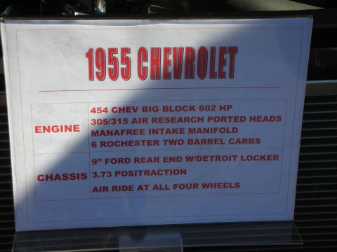 1998 Ford Crown Victoria - Car-show display card listing the engine and chassis specifications of a 1955 Chevrolet build.