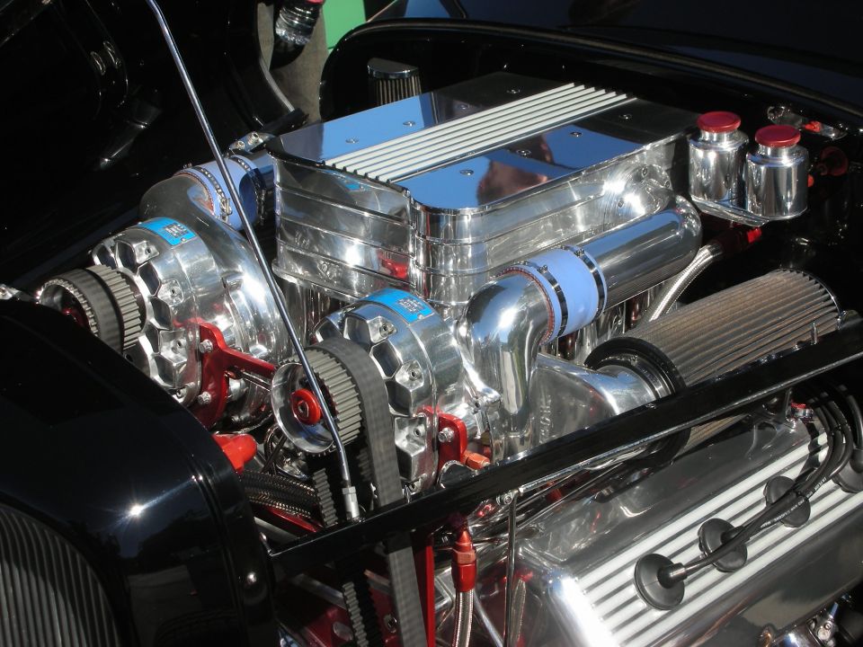 Chromed supercharged V8 hot-rod engine with twin blowers