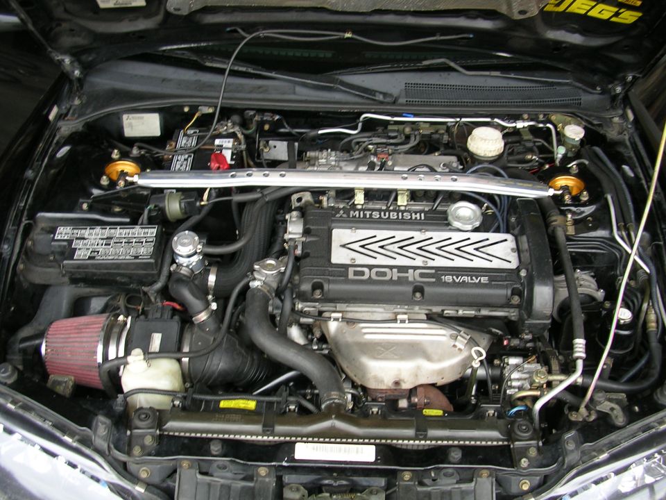 Engine bay with Mitsubishi DOHC 16 valve engine and aftermarket air intake