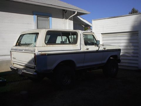 1978 Ford Bronco - This 1978 Ford Bronco is seen from a 3/4 front angle, a white and blue two-tone paint scheme.
