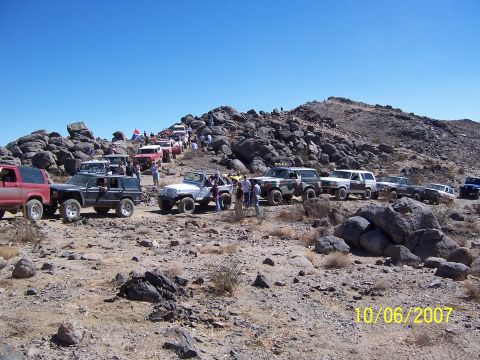 1996 Ford Bronco - A group of off-road vehicles gathered on a rocky terrain, with a date stamp indicating 10/06/2007.