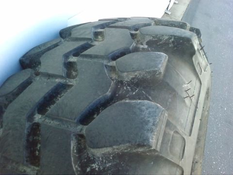 1995 Ford Bronco - Tire tread detail, likely for heavy-duty or off-road use.