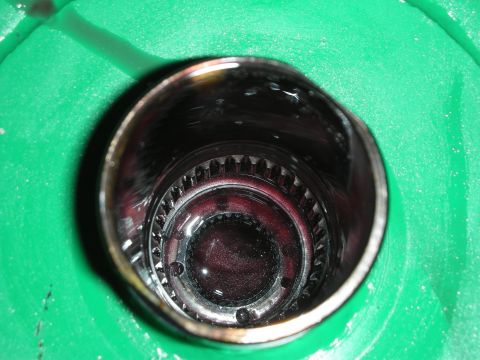 1992 Ford Crown Victoria - Internal view of a transmission component, showing gears and fluid, likely from a Ford Crown Victoria.