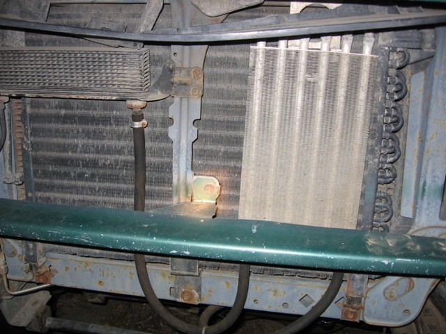 Radiator and oil cooler assembly with hoses attached, viewed from front