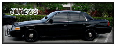 1998 Ford Crown Victoria - Side view of a black 1998 Ford Crown Victoria, equipped with a push bumper, parked next to another vehicle.