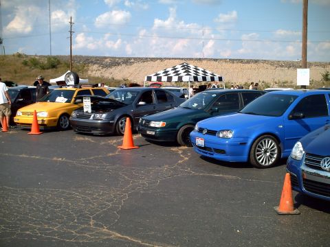 2003 Volvo S40 - A gathering of Volkswagen vehicles, with a blue Golf prominently displayed in the foreground.