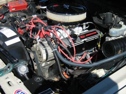 1988 Mercury Grand Marquis - Close-up view of a Ford engine, showing the valve covers and air intake system.