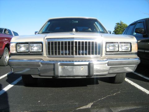 1988 Mercury Grand Marquis - Front view of a 1988 Mercury Grand Marquis, its distinctive chrome grille and dual rectangular headlights.