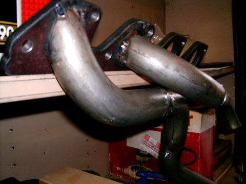 1978 Ford Mustang II - Custom exhaust headers are shown, with visible welds and a mounting flange.