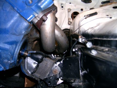 1978 Ford Mustang II - This photo shows exhaust headers and parts of an engine, not a complete vehicle.