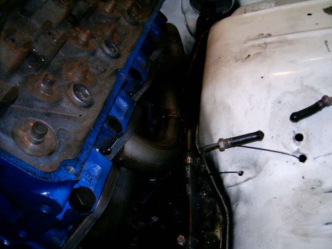 1978 Ford Mustang II - Close-up of an engine block and exhaust manifold, showing engine components.