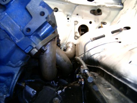 1978 Ford Mustang II - Close-up view of an engine compartment, focusing on the exhaust headers and part of the engine block.