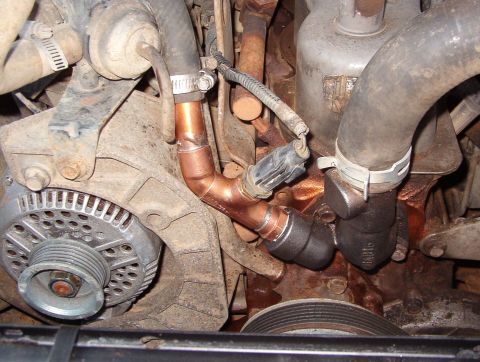 1983 Ford Bronco - It fits - it works! But I ended up having to use 2 hose clamps to keep it from slipping up since there are no hose barbs or even a nipple.…