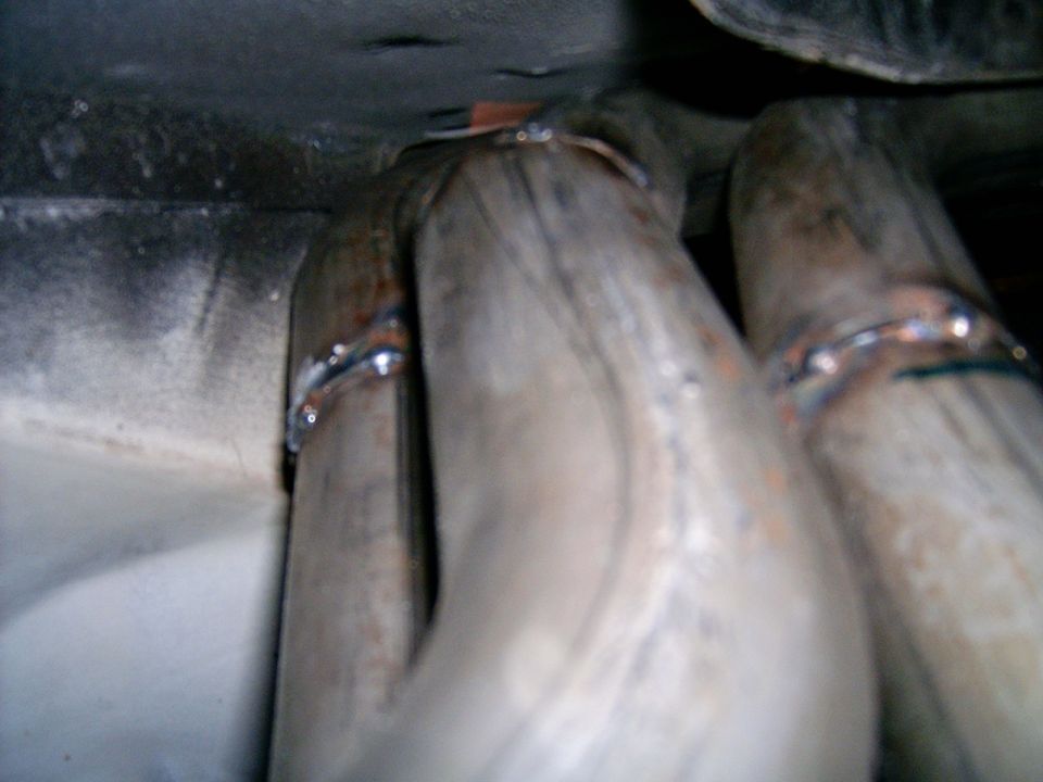 Exhaust headers with welded joints, viewed from underneath