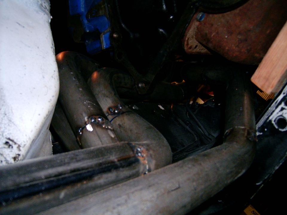 exhaust headers with visible welds