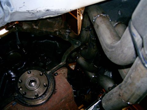 1978 Ford Mustang II - Close-up view of an engine block and custom exhaust headers, likely from a performance vehicle.
