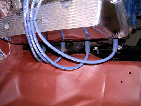 1978 Ford Mustang II - Close-up view of blue Ford Racing spark plug wires and a chrome valve cover on an engine.