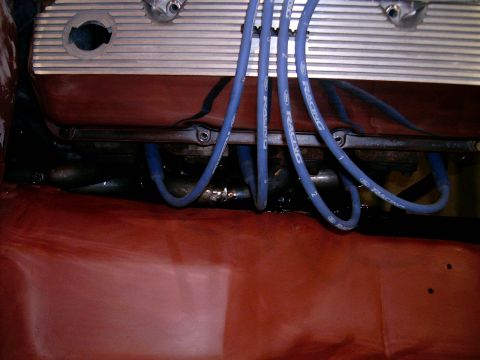 1978 Ford Mustang II - Close-up of engine components, including spark plug wires and valve cover, with visible "RACING" text.