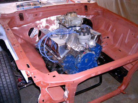 1978 Ford Mustang II - Engine bay undergoing restoration, showing a rebuilt engine with chrome accents.