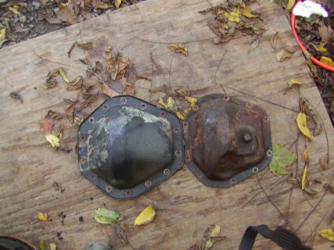 1991 Ford Bronco - Comparison of two differential covers, one in better condition than the other.