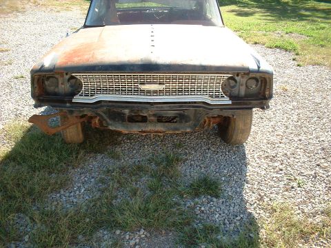 1963 Ford Galaxie - Front view of a 1963 Ford Galaxie showing its distinctive grille and missing headlight assemblies.
