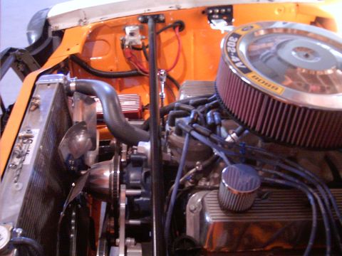 1978 Ford Mustang II - Close-up view of a modified V8 engine bay, an aftermarket air filter and radiator.