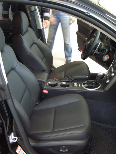 1974 Ford Bronco - Interior view of a car, showing the front seats and dashboard controls.