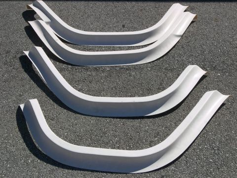 1974 Ford Bronco - Set of four white fender flares for sale, likely aftermarket parts.