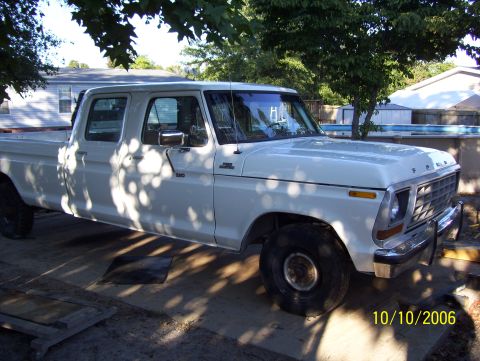 1978 Ford Bronco - This white 1978 Ford F-350 crew cab pickup truck is shown from the front three-quarter angle.