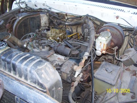 1978 Ford Bronco - Engine bay details including carburetor and brake booster. Photo dated 10/10/2006.