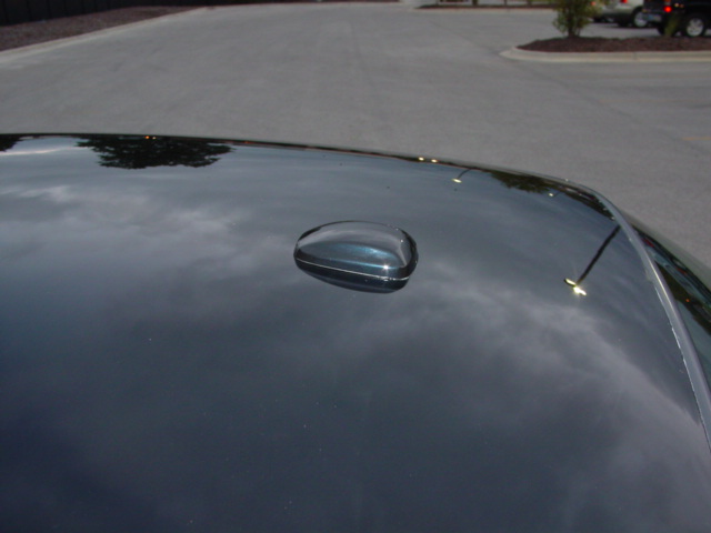 I didn't have the body shop fill one hole so I can mount an XM radio antenna. This antenna is not magnetic. It has a bolt on the bottom and is tightened with a nut. This antenna is actually from 06-07 Honda Accords. I bought it brand new from Honda along with the wires.