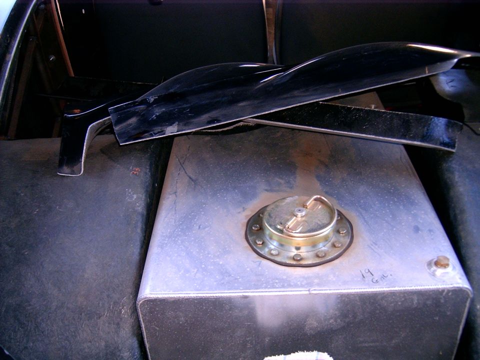 Aluminum fuel tank with brass cap and black interior trim pieces