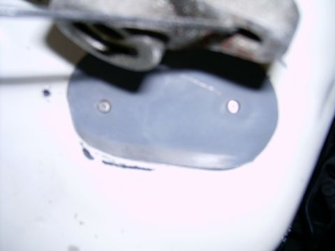 1978 Ford Mustang II - Car body panel repair with a riveted patch.