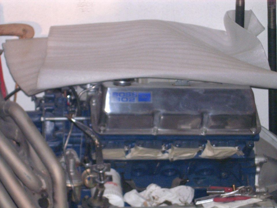 Engine with "BOSS 302" valve cover and exhaust headers