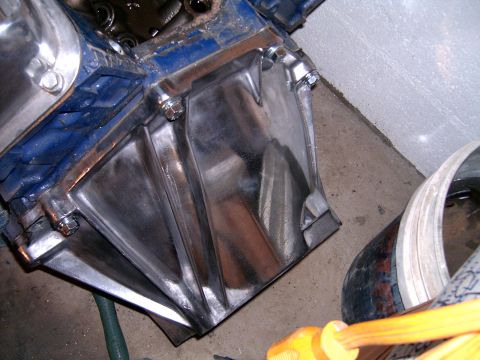 1978 Ford Mustang II - Close-up view of a polished aluminum engine oil pan, likely part of a larger engine assembly.