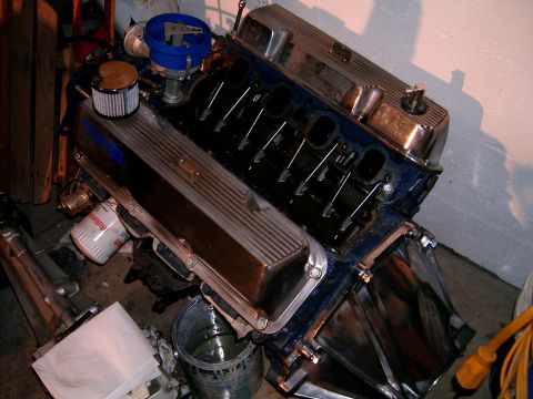 1978 Ford Mustang II - Engine assembly with chrome valve covers and blue distributor cap.