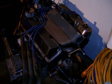 1978 Ford Mustang II - Engine assembly with chrome valve covers and blue spark plug wires.