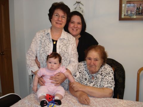 2000 Ford Crown Victoria - A family gathers for a photo, showing four generations of women.