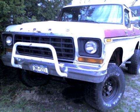 1978 Ford Bronco - This Ford truck, likely a 1979 model, is shown from the front with a prominent grille and bumper guard.
