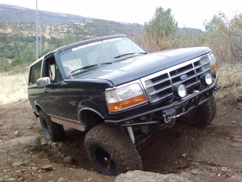 1995 Ford Bronco - This 1995 Ford Bronco is navigating a challenging off-road course.