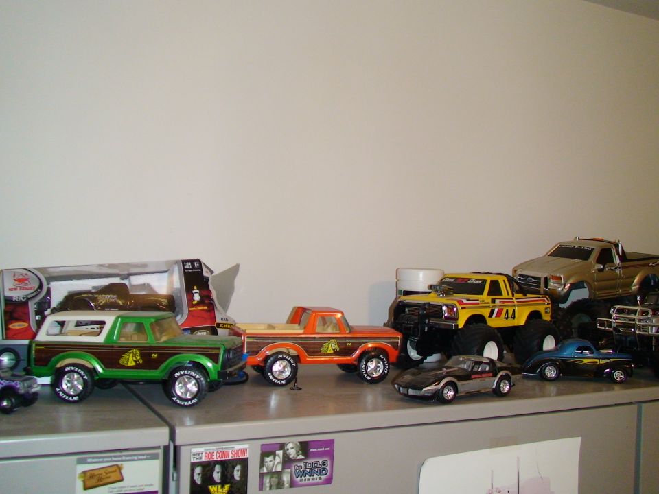 Green and brown toy 1979 Ford Bronco with wood paneling