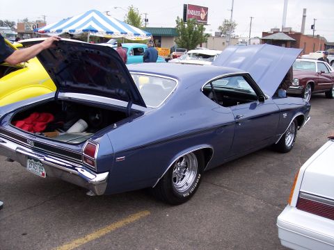 1972 Ford Ranchero - Blue 1969 Chevrolet Chevelle SS at a car show with other vehicles present.
