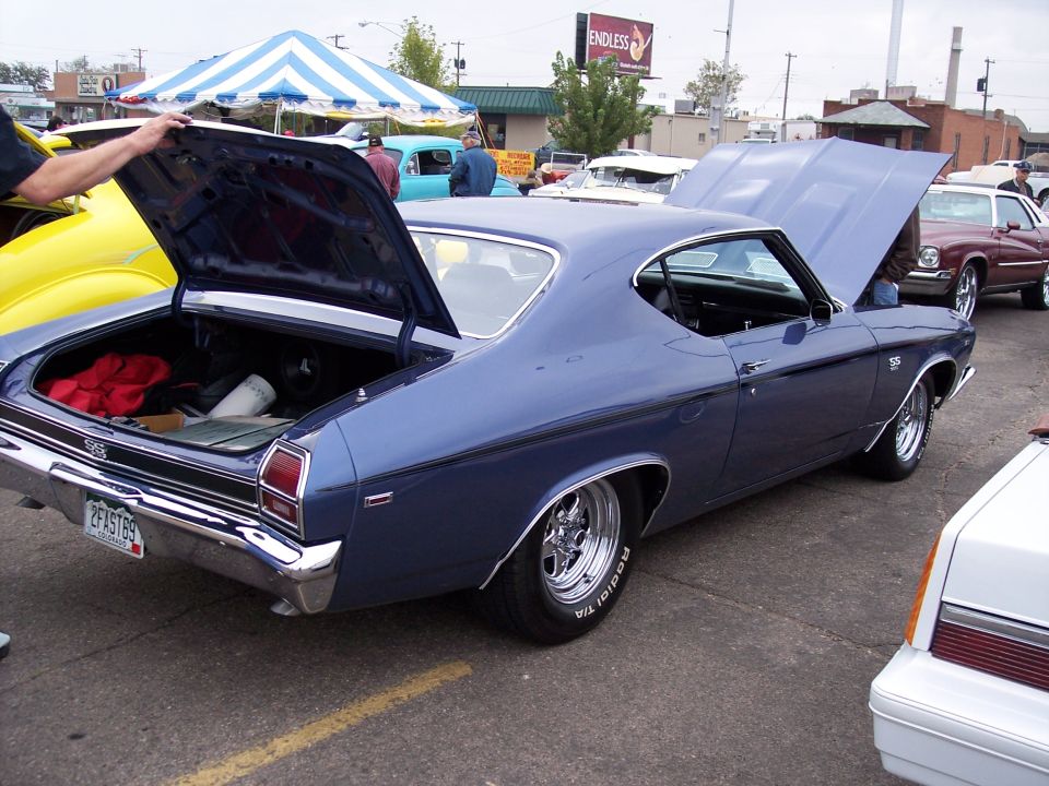 1969 Chevrolet Chevelle SS with trunk and hood open. License plate reads 2FASTB9