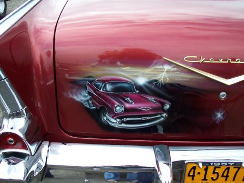 1972 Ford Ranchero - Airbrushed 1957 Chevrolet Bel Air on a red car trunk, with a lightning storm scene.