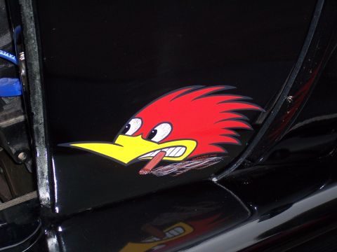 1972 Ford Ranchero - A custom roadrunner decal adorns the side of a black vehicle.