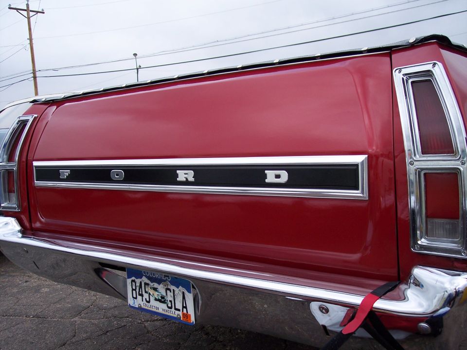 Red 1972 Ford Ranchero rear view with chrome bumper and Colorado license plate